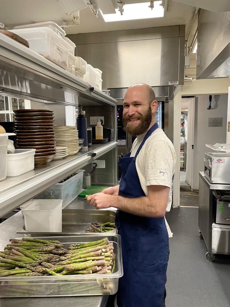 Alexander Scrase, founder of Cookatoo, in a professional kitchen